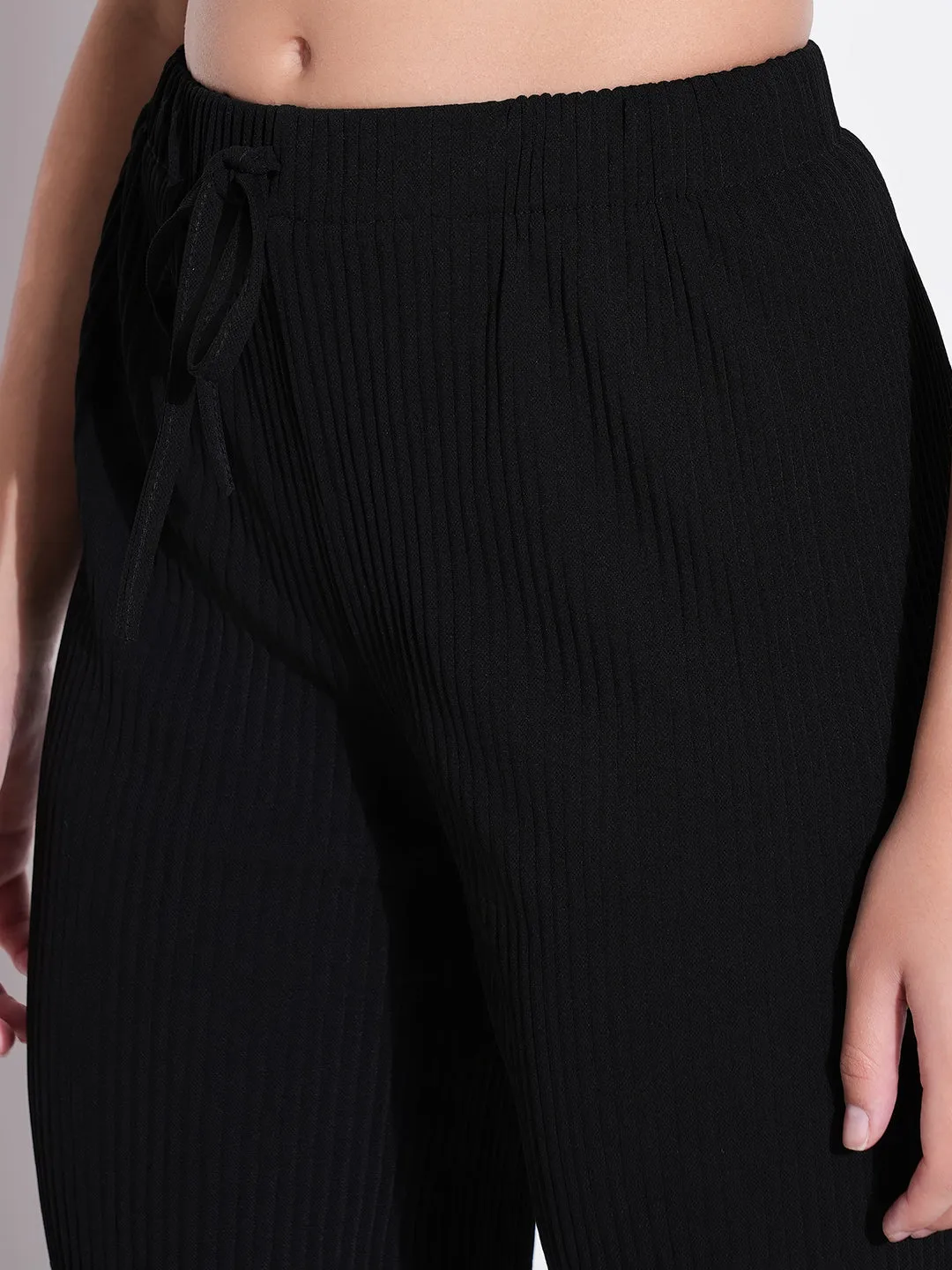 Women Black Solid Parallel Trousers